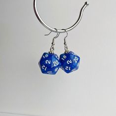 These Marble D20 Earrings are a great accessory for any tabletop gamer. Handmade by the DM of The Dicey Dungeon Undertale Earrings, D20 Earrings, Anime Backgrounds, Anime Backgrounds Wallpapers, Backgrounds Wallpapers, Random Things, Dungeons And Dragons, Shopping List, Jewelry Earrings Dangle