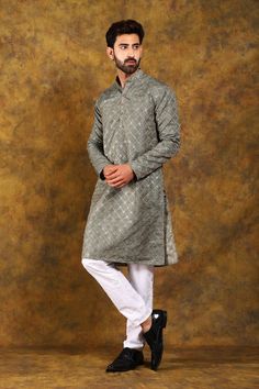 BLUESAANCHI MEN'S DARK GREY EMBROIDERED KURTA SET  This elegant dark grey kurta set from Bluesaanchi brings traditional design together with modern tailoring. Crafted with intricate embroidery, this kurta set is perfect for festive occasions, weddings, or any traditional gathering. Its timeless appeal ensures you make a stylish statement wherever you go.  Key Features  Beautiful dark grey shade with detailed embroidery  Regular fit for a comfortable yet stylish look  Full-sleeved kurta with a mandarin collar  Includes a matching churidar  Perfect for weddings, festivals, and cultural events   Specifications   Brand:  Bluesaanchi   Color:  Dark Grey   Fit:  Regular Fit   Pattern:  Embroidered   Sleeves:  Full Sleeves   Neck Type:  Mandarin Collar   Bottom Type:  Churidar   Occasion:  Ethnic Festive Gray Zari Work Sets, Festive Gray Diwali Outfit Sets, Gray Festive Sets For Diwali, Festive Embroidered Gray Sets, Festive Gray Sets For Eid, Festive Unstitched Gray Kurta, Traditional Gray Festive Sets, Traditional Gray Chikankari Embroidery Sets, Gray Straight Kurta For Festive Occasions