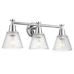 three light bathroom fixture in chrome finish with clear glass shades on the top and bottom