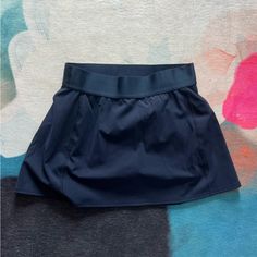 Brand: Aritzia Tna Color: Navy Condition: New Without Tags Size: S Athletic Tennis Skirt With Built In Shorts* Sports Mini Skirt With Pockets, Relaxed Mini Skort With Wide Waistband, Fitted Swim Skirt With Pockets, Sporty Skirted Skort With Elastic Waistband, Sports Skirted Bottoms With Pockets, Sports Mini Pleated Skirt, Short Sports Skirt With Lining, Sporty Skirted Bottoms With Pockets, Summer Sports Skirt With Wide Waistband