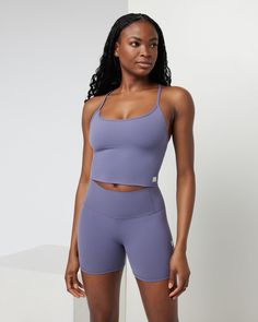 This flattering tank top has racerback straps and a modern scoop neckline. Our supremely soft and innovative Vuori BlissBlend™ fabric is a performance stretch knit that moves with you. Made with 75% recycled materials, this top delivers breathable, lightweight support. | Vuori AllTheFeels™ Tank Top | Cosmic | XS Vuori makes premium performance apparel inspired by the active Coastal California lifestyle; an integration of fitness, surf, sport, and art. Breaking down the boundaries of traditional Racerback Workout Tank Top, Coastal California, California Lifestyle, Workout Tank Top, Performance Outfit, Workout Tanks, New Perspective, Recycled Materials, Scoop Neckline