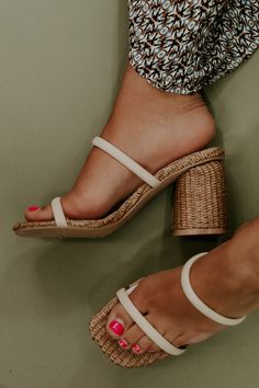 The Alaia Strappy Raffia Heel features a rattan block heel detail, and slip on style design. - Strap across toes- Slip on fit- 2.5in heel height Size & Fit Fits true to size and feel so comfortable! !This item is a part of our Vacay Vibes Collection. This collection is saturated with an inviting tropical inspired aesthetic, met with fully styled looks centered around a vivid color palette. This collection features intricate whimsical blouses, elevating floral prints, timeless accessories, and th Slip On Heels Outfit, Shoe Poses, Beach 2024, Vacay Vibes, Honeymoon Outfits, Inspired Aesthetic, Heels Outfits, Trending Sandals, Vip Group