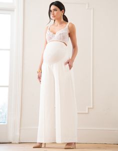 Featuring a strong and elegant silhouette, Seraphine's wide-leg over bump pants in an ivory colourway offer an ideal option for the bride who's looking for something a little different on her wedding day. Chic Full-length Wedding Bottoms, Chic Full Length Wedding Bottoms, Elegant Wide-leg Bottoms For Wedding, Elegant Wide Leg Wedding Pants, Elegant Wide-leg Wedding Pants, Chic Full Length Wide Leg Pants For Wedding, White Wide-leg Pants For Wedding, Fitted Wide-leg Pants For Wedding, Fitted Cream Bottoms For Wedding