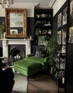 a living room filled with furniture and a fire place in front of a large mirror