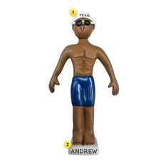 a plastic figurine is shown with the words new year and an image of a man in swimming trunks