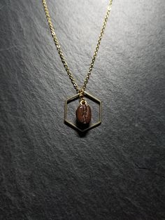 This beautiful necklace is a wonderful idea for gift giving and as a little gift for yourself. The pendant is approximately 2cm x 2.2cm. Please choose your chain length preference in the drop down box. See more jewellery here: https://www.etsy.com/shop/simplysweetjewellery I'm happy to help you find what you're looking for! Please feel free to message me with any questions. Thank you for shopping at Simply Sweet Jewellery! PLEASE NOTE: Colours may not look the same as on your computer - Avoid an Coffee Bean Necklace, Handmade Hexagon Necklace For Gift, Handmade Coffee Colored Jewelry For Gifts, Handmade Coffee-colored Jewelry For Gift, Hexagon Jewelry With Adjustable Chain For Gifts, Coffee Necklace, Bean Necklace, Coffee Jewelry, Hexagon Pendant