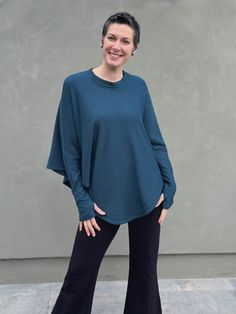 caraucci teal blue bamboo cotton fleece oversized poncho with thumbholes #color_teal Oversized Comfy Top For Relaxation, Comfy Oversized Tops For Relaxation, Comfortable Oversized Tops For Relaxation, Cozy Slouchy Tops For Loungewear, Oversized Sweatshirt For Relaxation, Oversized Long Sleeve Sweatshirt For Relaxation, Oversized Cozy Top For Layering, Cozy Oversized Top For Layering, Cozy Oversized Tops For Layering