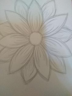 a drawing of a flower on paper