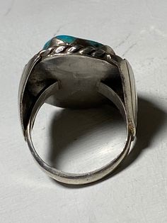 "Turquoise ring Navajo southwest tribal sterling silver women As Is - Wearable as is side of the setting is ever so slightly bent Size 7.75 Weight 11.3g Length 1. 1/8\" Width. 9/16\" Thinnest part of band 1/8\" Delivered in a Gift Box Free Shipping and Free Postal Insurance If you do not want the ring polished and want to leave the natural patina please let me know at the time of purchase as I do polish rings before I ship rings out. Thanks USPS Domestic Shipping is free for buyers. If a buyer p Southwestern Style Turquoise Ring Stamped 925, Southwestern Style Stamped 925 Turquoise Ring, Collectible Southwestern Turquoise Ring Stamped 925, Coral Turquoise, Sterling Silver Bands, Turquoise Sterling Silver, Silver Band, Stone Rings, Turquoise Ring