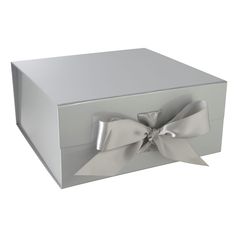 a silver box with a bow on it