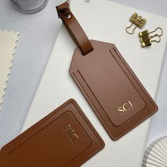 Personalised tan luggage tag with initials, brown recycled leather suitcase/bag tag for travel with foil blocked personalisation. Perfect for an upcoming trip, frequent traveler or as a gift for a honeymoon, wedding, anniversary or special occasion.  - Tan/Brown recycled leather  - Silver Buckle  - Personalise with up to 3 initials - Gold, silver, black or rose gold personalisation - Includes a card for name/address details  Personalised luggage tags and travel accessories make a thoughtful and Gap Year Travel, Leather Suitcase, Suitcase Bag, Personalized Luggage, Leather Luggage Tags, Travel Luggage Tag, Leather Luggage, Recycled Leather, Leather Silver