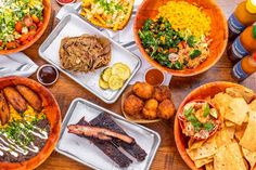 a table topped with lots of different types of food