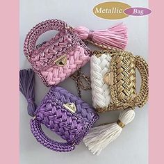 four different purses with tasselled handles are shown in this advertisement for metallic bag