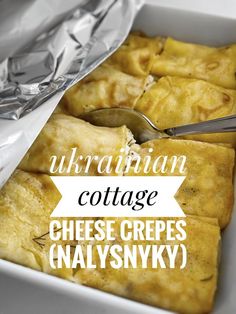 a close up of food in a pan on a table with text that reads ukraine cottage cheese crepes analsyky