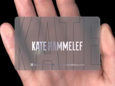 a hand holding a business card that says kate hammele