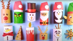 christmas crafts made out of toilet rolls and paper tubes with santa claus, snowman, elf