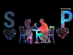 two people sitting at a table in front of the word sip spelled with neon lights