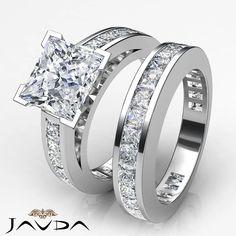 two white gold wedding rings with princess cut diamonds