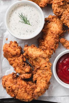 fried chicken with dipping sauce on the side