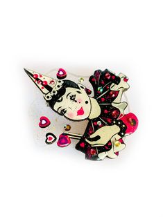 Jazz up your outfit with this brooch by Rosie Rose Parker! This stunning Pierrot clown brooch is a quirky and playful addition to any fashion ensemble. Featuring an intricate design with star acrylics and hand-placed gems, this French-themed brooch is sure to turn heads. Measures 6cm x 5cm and made with wood, resin, and glitter acrylics. Ooh la la! Unique Party Brooch Pins, Star Acrylics, Pierrot Clown, Novelty Handbags, Acrylic Bracelet, Bone China Tea Set, Puzzle Crafts, Subversive Cross Stitch, China Tea Sets