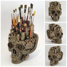 there is a skull made out of pencils and markers