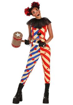 a woman dressed in clown makeup and holding a hammer