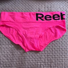 Nwot Women’s Reebok Pink And Black Signature Athletic Panties, Size S. Super Stretchy Material. Pink Letter Print Activewear For Sports, Pink Breathable Bottoms For Light Exercise, Breathable Pink Bottoms For Light Exercise, Pink Athleisure Activewear With Letter Print, Pink Stretch Activewear With Letter Print, Pink Fitted Activewear With Letter Print, Pink Athletic Fit Bottoms For Sports, Pink Letter Print Activewear For Gym, Womens Reebok