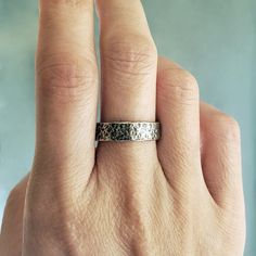 "To create these rings, I hammer a rough, stone-like pattern into a thick, handmade, solid sterling silver bands. As these rings are hand-textured and finished, each ring is one of a kind. Bands measure 6mm x 1.5mm and just over 4mm x 1.5mm. Please indicate ring sizes desired in your note to seller at checkout. Choose from a Matte, Antiqued, or Blackened finish. With the blackened version, the color of the ring will adjust with wear; the band will arrive in a uniform black, but develop a nice, d Hammered Nugget Ring For Anniversary, Artisan Hammered Jewelry For Anniversary, Rustic Hammered Jewelry For Anniversary, Texture Wedding, Silver Bands, Rock Rings, Stone Texture, Wedding Ring Set, Ring Sizes