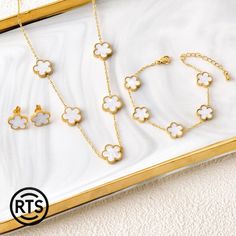 Enhance your style with our Elegant Enamel Clover Jewelry Set, featuring a beautifully coordinated necklace, bracelet, and earrings. Each piece is adorned with delicate enamel clover charms, set in a gold-plated finish, providing a touch of elegance and sophistication to any outfit. Features: *Design: This set includes a necklace, bracelet, and earrings, each featuring the iconic four-leaf clover design, symbolizing luck and prosperity. *Versatile: Perfect for both everyday wear and special occasions, adding a chic touch to any ensemble. *Gift Ready: Comes beautifully packaged, making it an ideal gift for birthdays, anniversaries, holidays, or just because. Specifications: *Necklace Length: Adjustable to fit comfortably *Bracelet Length: Adjustable with a secure clasp *Earrings: Stud style Blossom Jewelry, Wings Necklace, Clover Jewelry, Titanium Bracelet, Mens Jewelry Necklace, Pearl Necklaces, White Bracelets, Red Bracelets, Fashion Jewelry Sets