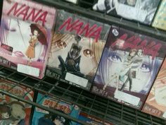 several anime dvds are on display in a store