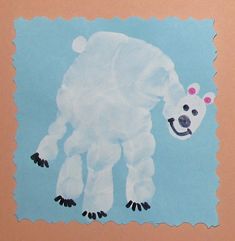 a paper cut out of a polar bear