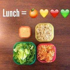 the lunch box is filled with different types of food, including lettuce and carrots