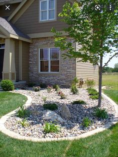 a house with landscaping in the front yard