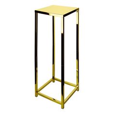 a gold and black metal side table on a white background