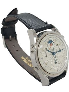 Vintage White Watch With Tachymeter, Timeless Collectible Watches With Tachymeter, Classic Chronograph Watch As Collectible, Classic Collectible Chronograph Watch, Black Collectible Watches With Subdials, Collectible Analog Chronograph Watch, Collectible Black Watch With Subdials, Collectible Analog Chronograph Watch With Round Dial, Timeless Automatic Watches For Collectors