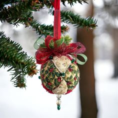 a christmas ornament hanging from a tree