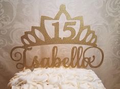 there is a cake with white frosting and gold lettering on it that says fabulous