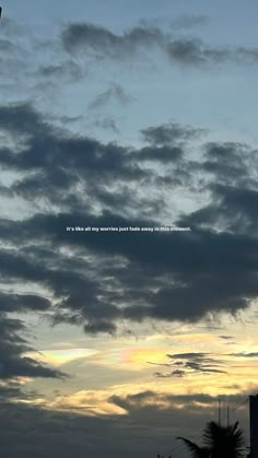 an airplane is flying in the sky with clouds behind it and a quote written below