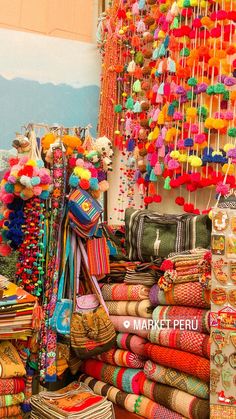 many colorful items are on display at the market