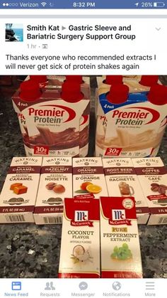 several boxes of protein drink sitting on top of a counter