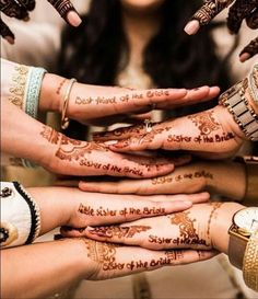 many hands with hendi designs on them are stacked up in a circle and the words god friend of the bride written on their palms