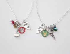 two necklaces with charms that say party me and not here on them, hanging from silver chains