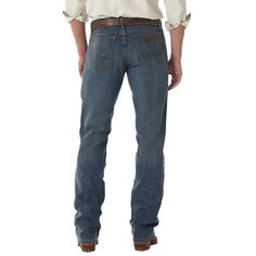 PRICES MAY VARY. ORIGINAL FIT. Designed with a functional fit in mind, these jeans are made to stack over your favorite pair of boots. Constructed with a comfortable fit in the waist, seat, and thigh, this jean is made for both function and comfort for long days in the saddle CLASSIC COWBOY JEAN. Made for authentic cowboys and worn by world champions, this original cowboy cut jean is a tried and true classic. As the Official ProRodeo Competition jean, this western denim essential will stay with Cowboy Cut Jeans, Wrangler Cowboy Cut, Denim Essentials, Comfortable Jeans, Cowboy Style, Wrangler Jeans, Mid Rise Jeans, Slim Jeans, Cut Jeans