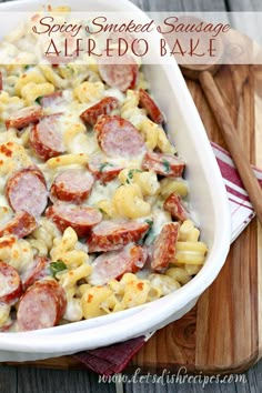 a casserole dish filled with sausage and pasta