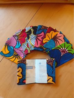 Find other items in my store by clicking on the following link: https://www.etsy.com/fr/shop/vitacris?ref=simple-shop-header-name&listing_id=958352284 Passport case in African wax batik loincloth Making a passport is very expensive so it is better to protect it Why not in all elegance and style The case is standard with easy removal when presented for customs or the airport The case is 2 layers of fabric Beautiful finish and effective protection Machine washable Rapid dispatch TRACKED MAIL Passport Case, Flowers Gift, Wedding Fabric, Passport Cover, African Fabric, Flower Gift, Favorite Things Gift, Wedding Shop, Batik