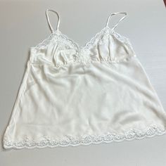 100% Silk Cream Lace Top Camisole Lingerie. Perfect Condition Never Worn. Gold Hawk R8 Elegant Tank Top With Lace Trim For Loungewear, Elegant Lace Tank Top Bra Friendly, Feminine White Silk Camisole, Feminine Lace Top Camisole, Sleeveless Delicate Lace Sleep Camisole, Sleeveless Lace Camisole For Sleep, Elegant White Bra-friendly Camisole, Feminine Sleeveless Camisole For Wedding Night, Sleeveless Lace Camisole For Wedding Night