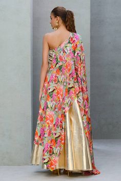 Multicolour one shoulder cape with all over floral print and sequin bead embellishments. Comes with vegan leather skirt. - Aza Fashions Multicolor Floral Print Pre-draped Saree For Party, One Shoulder Dress With Zari Work For Designer Wear, One-shoulder Bollywood Dress With Zari Work, One Shoulder Bollywood Dress With Zari Work, Bollywood One Shoulder Dress With Zari Work, Bollywood Style One-shoulder Festive Dress, Bollywood One Shoulder Festive Dress, Bollywood One-shoulder Festive Dress, Festive One-shoulder Dress With Sheer Dupatta