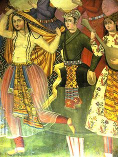 an old painting with people dressed in ethnic clothing