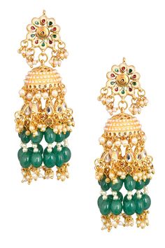 This pretty handcrafted dome shaped jhumkas with beaded danglers, dangling chains and emerald colored beads connected to a decorated kundan floral with a white pearl. The surreal combination will give you perfect festive look. Product Features: Color: emerald Material: Copper Alloy Work: Embellished with kundan & on back side meenakari comes Fastening: Bullet Clutch Wash Care: Spot-Cleaning only. Store in a separate box. Keep away from fragrance and water. Product Type: Earrings Disclaimer: Ther Festive Look, You Are Perfect, White Pearl, Pearl Beads, Pearl White, Product Features, Emerald, Charm Bracelet, Copper