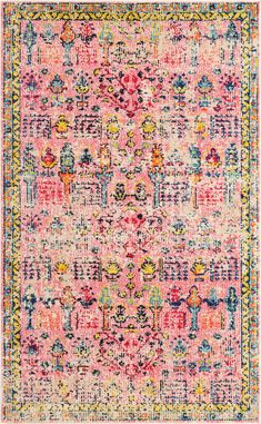 an area rug with various colors and patterns on the ground, including pinks, yellows, blue, and green